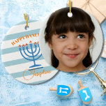 Ornamento De Cerâmica Hanukkah Menorah Foto Azul Laranja<br><div class="desc">Mude seu desejo de Chanucá com este moderno design Menorah striped. Ainda usando as cores sazonais tradicionais. O Menorah azul tem chamas laranja. Blues e laranjas. Há um lugar para sua própria foto pessoal ou familiar,  saudação moderna e simples de Hanukkah.</div>