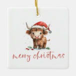 Ornamento De Cerâmica Highland Cow Papais noeis Nome do roteiro Feliz Na<br><div class="desc">Papais noeis de Vaca Highland Nome do roteiro Feliz Natal. Bonitinha festiva para decoração de Natal,  com esta design divertida com uma doce vaca em terras altas no seu chapéu de Papai Noel. Feliz Natal está num roteiro de na moda.</div>