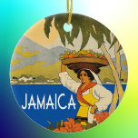 Ornamento De Cerâmica Ilustração de estilo de viagens vintage da Jamaica<br><div class="desc">Esta imagem colorida foi revista de uma viagens vintage de publicidade na Jamaica no Caribe. O nome Jamaica é adicionado em uma fonte de deco de arte retrô. A mulher na ilustração carregar uma cesta de fruta na cabeça, com o oceano e montanhas no fundo e flores de hibisco no...</div>