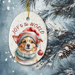 Ornamento De Cerâmica Joy Cachorro Bonito para o Mundo<br><div class="desc">Na frente deste ornamento de Férias está uma bela imagem de um cão Corgi vestido com um chapéu de Papai Noel com ornamentos pendurados. Atrás da imagem está um fundo de aspersão de confete dourado. O texto vermelho diz "Joy to the World". A parte de trás do ornamento tem o...</div>