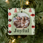 Ornamento De Cerâmica Joyful 4 Family Photo Collage Arco Verde de Natal<br><div class="desc">Celebre a temporada com esta alegre colagem de fotos de Natal, um ornamento cerâmico, projetado em uma forma festiva de arco verde que adiciona um toque alegre à sua decoração de férias. A frente apresenta espaço para uma foto da família favorita, enquadrada por um padrão de Natal divertido, enquanto a...</div>