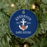 Ornamento De Cerâmica Lago Náutico House Anchor Winter Floral Blue<br><div class="desc">Nome da Família do Lago Náutico Nome Marinho Blue Ornament. Âncora com Watercolor Floral,  incluindo poinsetos vermelhos,  cones de pínus e outros belos verdes de inverno.</div>