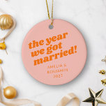 Ornamento De Cerâmica Laranja Rosa Personalizado Primeiro Natal Casado<br><div class="desc">Celebre seu primeiro Natal como um casal casado com este adorável ornamento personalizado com tipografia retrô ousada em matizes cor-de-rosa e laranja pastel. Este ornamento cerâmico traz um toque divertido, mas na moda, ao seu decoro de férias, capturando perfeitamente a alegria de sua primeira temporada de festas juntos. A design...</div>