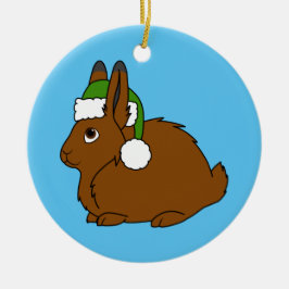 Ornamento De Cerâmica Lebre ártica de Brown com o chapéu do papai noel