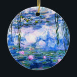 Ornamento De Cerâmica Lírios de Água Rosa Monet<br><div class="desc">Um ornamento de lírios cor-de-rosa monet com lindos lírios de água rosa flutuando em um lago azul calmo com almofadas de lírios. Um presente de Monet excelente para fãs do impressionismo e da arte francesa. Inimpressionismo sereno na natureza com lindas flores e paisagem de lagoas cênicas.</div>