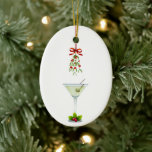 Ornamento De Cerâmica Martinis e Mistletoe Christmas<br><div class="desc">Mistletoe amarrado com uma fita vermelha se pendura sobre um clássico vidro martini para comemorar uma ocasião especial nesses Enfeites de natal. Excelente a favor de uma festa de cocktail de Natal, chá de panela de Natal ou casamento, festa de férias, festa de férias de escritório ou festa de aniversário...</div>