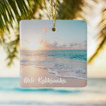 Ornamento De Cerâmica Mele Kalikimaka Tropical Island Photo Christmas<br><div class="desc">This pretty seaside Christmas ornament features a gorgeous coastal seascape photo at sunrise with lovely typography that reads Mele Kalikimaka. A cute Hawaiian way to say Merry Christmas in style with lovely island photography. Take me to the beach this holiday.</div>