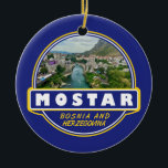 Ornamento De Cerâmica Mostar Bósnia e Herzegovina - Viagem de Arte Emble<br><div class="desc">Retro viagem de Mostar design em estilo emblema. É conhecida pela icônica Stari Most (Old Bridge),  uma ponte medieval arquitetada reconstruída.</div>
