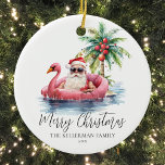 Ornamento De Cerâmica Natal da Praia Funny<br><div class="desc">Entre no espírito de férias com este Enfeites de natal único com um Papai Noel relaxado em óculos escuros saltando em um flamingo rosa no oceano. Perfeito por adicionar uma vibe de praia à sua árvore de Natal, este ornamento é ideal para aqueles que vivem em locais tropicais como a...</div>