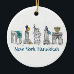 Ornamento De Cerâmica New York Hanukkah NYC Landmarks Jewish Holiday<br><div class="desc">Os ornamentos do Hanukkah em Nova York apresentam pontos de referência Nova Iorque "vestidos" para Hanukkah em marrãs, menorahs, sonhos e luzes. Criado de uma ilustração do marcador original. Não vê o que está procurando? Precisa de ajuda para a personalização? Entre em contato com Rebecca para ter algo projetado só...</div>