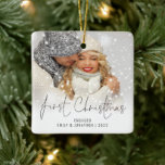 Ornamento De Cerâmica Nome da Foto Ano Primeiro Natal Envolvido<br><div class="desc">Nomes de Sobreposição de Fotografias no Primeiro Natal Envolvido. Para comemorar seu primeiro feriado, personalize facilmente seus nomes e ano. Com um roteiro elegante para o Primeiro Natal. Escolha sua foto favorita para substituir a imagem de exemplo. As alterações nas cores do texto podem ser feitas para melhor se adequar...</div>