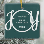 Ornamento De Cerâmica Nome Personalizado de Natal do Bebê Nome Verde<br><div class="desc">Esta saudação de manutenção do Primeiro Ornamento de Natal de Baby é decorada com a palavra JOY em tipografia de na moda num fundo verde. Facilmente personalizável.</div>