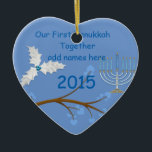 Ornamento De Cerâmica Nosso primeiro Hanukkah Ornament junto o presente<br><div class="desc">As penas e Menorah fazem a este ornamento um presente muito especial por um feriado onde você estima</div>