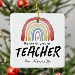Ornamento De Cerâmica O melhor professor do mundo no Rainbow Christmas<br><div class="desc">Enfeites de natal de apreciação do professor com uma aquarela,  um arco-íris,  um coração vermelho,  o bonito ditado "o maior professor do mundo",  e seu nome.</div>