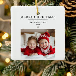 Ornamento De Cerâmica "Ornamento de Feliz Natal Personalizado com Foto<br><div class="desc">"Comemore a época de festas com este Ornamento de Natal Personalizado, com espaço para uma foto e um nome personalizados. Perfeito como um coração de guardas, este ornamento adiciona um toque pessoal ao decoro de Natal. Com uma saudação festiva de "Feliz Natal", é um presente ideal para a família, amigos...</div>