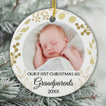 Ornamento De Cerâmica Our First Christmas As Grandparents Gold Photo<br><div class="desc">This elegant Grandparents Christmas Ornament is decorated with gold foliage on a white background.
Easily customizable with baby's photo and year.
Original Watercolor © Michele Davies.</div>