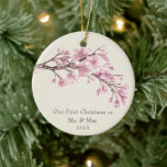 Ornamento De Cerâmica Our First Christmas as Mr. and Mrs. Cherry Blossom<br><div class="desc">Did you get married this year? Add a memory to your tree with this elegant floral keepsake ceramic ornament featuring a branch consisting of watercolor painted pink cherry blossom flowers on the top over an ivory background. Below is the message, "Our First Christmas as Mr. and Mrs." and the year...</div>