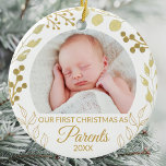 Ornamento De Cerâmica Our First Christmas As Parents Gold Foliage Photo<br><div class="desc">This elegant Parents' Christmas Ornament is decorated with gold foliage on a white background.
Easily customizable with baby's photo and year.
Original Watercolor © Michele Davies.</div>