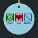 Ornamento De Cerâmica Peace Love Clarinets<br><div class="desc">O presente bonito do Peace Love Clarinets. Um design de clarinete fofo para orquestra ou banda com um bonito sinal de paz,  coração e instrumento.</div>