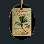 Ornamento De Cerâmica Primavera Altamonte  Palm Tree Viagens vintage<br><div class="desc">Um impressão moderno do século médio de Altamonte Primavera na Flórida no estilo viagens vintage. Ele apresenta uma palmeira curva na praia arenosa com oceano sob um céu azul nublado.</div>
