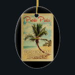 Ornamento De Cerâmica Puerto Plata Palm Tree Vintage Travel<br><div class="desc">A uniquely retro mid-century modern Puerto Plata Dominican Republic art print in vintage travel poster style. It features a curved palm tree on sandy beach with ocean under a blue cloudy sky.</div>