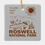 Ornamento De Cerâmica Roswell National Park UFO Flying Saucer Aliens T-S<br><div class="desc">Roswell National Park - you were never here! This funny UFO ornament is the perfect gift for alien believers and anyone that is familiar with the events of July 1947 in Roswell, New Mexico. This design features a hand drawn illustration of a flying saucer crash with a funny quote and...</div>