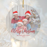 Ornamento De Cerâmica Roteiro Vermelho de Foto da Família Feliz Natal<br><div class="desc">Espalhe a alegria de férias para amigos e familiares com este enfeite moderno. O texto vermelho diz "Feliz Natal" em um roteiro elegante de escrita manual. Substitua a imagem de exemplo por sua foto favorita e adicione seu nome de família e o ano. Um filtro de gradiente branco ajuda a...</div>