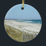 Ornamento De Cerâmica Sandy Beach com ondas<br><div class="desc">Este Sandy Beach maravilhoso não tem nenhuma pessoas porque a temperatura se estava congelando quando a foto foi tomada. Eu não sou certo se a praia é perfeita sem pessoas ou somente quando mobbed por pessoas. A areia, as ondas e o céu combinam para fazer a isto uma imagem bonita....</div>