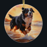 Ornamento De Cerâmica Sandy Paws Bernese Mountain Dog em Beach Sunset<br><div class="desc">Mergulhe na beleza tranquila do nosso cão "Sandy Paws and Sunset Hues" na design do pôr do sol da praia. Esta cena cativante captura a essência de uma noite perfeita na costa, com um companheiro leal canino desfrutando das areias ouros e das lutas respiratórias do sol. Quer você seja um...</div>