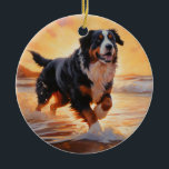 Ornamento De Cerâmica Sandy Paws Bernese Mountain Dog em Beach Sunset<br><div class="desc">Mergulhe na beleza tranquila do nosso cão "Sandy Paws and Sunset Hues" na design do pôr do sol da praia. Esta cena cativante captura a essência de uma noite perfeita na costa, com um companheiro leal canino desfrutando das areias ouros e das lutas respiratórias do sol. Quer você seja um...</div>