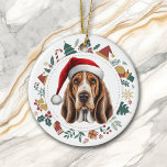Ornamento De Cerâmica Santa Hat Basset Hound Dog Fúria Fúria<br><div class="desc">Aqui está um belo ornamento personalizado para qualquer um que ama um cão Basset Hound. A frente tem um cão de aquarela vestindo um chapéu de Papai Noel vermelho e branco. A imagem é enquadrada dentro de uma coroa circular colorida composta por várias imagens de Férias, incluindo um boneco de...</div>