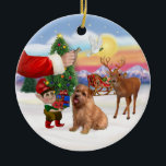 Ornamento De Cerâmica Santas Treat para seu Norfolk Terrier<br><div class="desc">Papais noeis oferecem a seu Norfolk Terrier um deleite enquanto um elfo ajuda a carregar o trenó.</div>