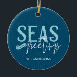 Ornamento De Cerâmica Seas and Greetings Photo Ceramic Ornament<br><div class="desc">Send Seas and Greetings to family and friends this holiday season.
A nautical photo ornament on an ocean blue background. Full photo back.</div>