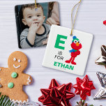 Ornamento De Cerâmica Sesame Street | Elmo de Inverno<br><div class="desc">O Quebra-Nozes com Elmo e Tango | Este gráfico divertido apresenta Elmo posando com um chapéu e cachecol de inverno.</div>