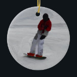 Ornamento De Cerâmica Snowboarder "preparing to ski'" Winter Sports Gift<br><div class="desc">A cool Snowboarder is making his final adjustments before hitting the slopes at Silver Star Mountain ski resort. Great for Kids and Sportspeople of all ages. Artwork created by Val Brackenridge ©.</div>