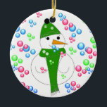 Ornamento De Cerâmica Snowman Bubble Mania<br><div class="desc">Uma bolha legal soprando boneco de neve,  bolhas de cores brilhantes o cercam. Tudo embrulhado em seu chapéu quente e cachecol.</div>