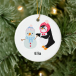 Ornamento De Cerâmica Snowman e Pinguim congelados<br><div class="desc">Snowman e Penguin são o mais legal duo na terra maravilhosa do inverno! Trazendo uma mistura deliciosa de calor, humor e aventuras geladas para o mundo nevado que eles chamam de lar. Quer estejam construindo fortalezas, patinando no gelo, ou embarcando em jornadas alarmantes, Frosty, o Homem de Neve e o...</div>