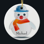 Ornamento De Cerâmica Snowman Ornament<br><div class="desc">Feliz e festivo boneco de neve para decorar seu feriado. Personalize substituindo "Michael" por qualquer nome. Design criado por Black Brook Photoographic com gráfico de Pixabay setembro de 2014.</div>