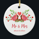 Ornamento De Cerâmica Sr. Cardinal Lovebird Personalizado<br><div class="desc">Decorre sua árvore com este design "Sr. e Sra.", com uma bonito aquarela de dois cardeais vermelhos. Os pombinhos são face a face, tocados em verduras sazonais com coração entre eles. Por baixo de "Sr. e Sra." está escrito em divertida tipografia moderna e você pode personalizar com os primeiros nomes...</div>