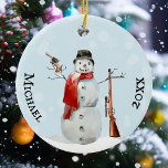 Ornamento De Cerâmica Tiro de tiro ao pé da arma Snowman<br><div class="desc">Este design pode ser personalizado na área fornecida pela alteração da foto e/ou do texto. Ou pode ser personalizado clicando em Personalizar este Modelo e, em seguida, escolhendo o clique para personalizar mais a opção e excluir ou alterar a cor do plano de fundo, adicionar texto, alterar a cor ou...</div>