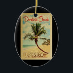 Ornamento De Cerâmica Viagens vintage de Árvore de Palma de Deerfield Be<br><div class="desc">Um impressão de arte da Flórida de Deerfield Beach,  do século médio,  em estilo viagens vintage. Ele apresenta uma palmeira curva na praia arenosa com oceano sob um céu azul nublado.</div>