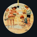 Ornamento De Cerâmica Vintage Antiguamente Beach Boy Children Fine Art<br><div class="desc">Na praia - Um antigo impressão de arte de crianças vitorianas brincando na areia. Um trabalho de arte impressão gráfico de arte costeira.</div>