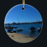 Ornamento De Cerâmica Vista de Balboa Island, Newport Beach, Califórnia<br><div class="desc">Uma manhã ensolarada de inverno caminhando na Ilha Balboa em Newport Beach,  Califórnia. Vista através do canal é o Pavilhão Balboa e Zona Diversa na Península Balboa. Foto de fevereiro de 2016.</div>