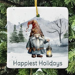 Ornamento De Cerâmica Watercolor Winter Christmas Gnomo<br><div class="desc">Adicione um toque encantador à sua árvore neste feriado com um Ornamento Cerâmico de Natal em Watercolor, Gnomo Holiday. Design de ornamento apresenta um alegre gnomo de Natal segurando uma lanterna iluminada com um fundo de floresta montanhosa com neve caindo. Itens adicionais de presentes e feriados disponíveis com este design...</div>