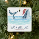 Ornamento De Cerâmica Whale Santa Seas & Greetings Coastal Christmas<br><div class="desc">Nautical theme coastal Christmas ornament features a watercolor whale wearing a Santa hat swimming in the sea with string lights decorating its tail and a "Seas & Greetings" caption (both lines of text can be personalized). Visit my "Whale Santa Seas & Greetings" collection for coordinating Christmas cards, Christmas party invitations,...</div>