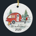 Ornamento De Cerâmica Winter Holiday RV Camper Monogram Family Snow<br><div class="desc">This design was created though digital art. It may be personalized in the area provided or customizing by changing the photo or added your own words. Contact me at colorflowcreations@gmail.com if you with to have this design on another product or to change the number, gender or hair color of the...</div>