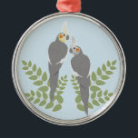 Ornamento De Metal Casal Cockatiel<br><div class="desc">Casal romântico com folhas. cor de fundo personalizável.</div>