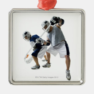 Ornamento De Metal Dois homens novos que jogam o lacrosse