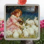 Ornamento De Metal Girl feeding rabbits<br><div class="desc">Vintage girl feeding rabbits</div>