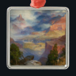 Ornamento De Metal Grand Canyon in Mist (por Thomas Moran)<br><div class="desc">Esta design apresenta uma pintura do artista americano Thomas Moran (1837-1926). Mostra uma visão do Grand Canyon no estado de Arizona dos EUA. O canyon,  que foi esculpido na paisagem pelo Rio Colorado,  está envolto em neblina e neblina. Há algumas árvores crescendo em alguns picos rochosos no primeiro plano.</div>
